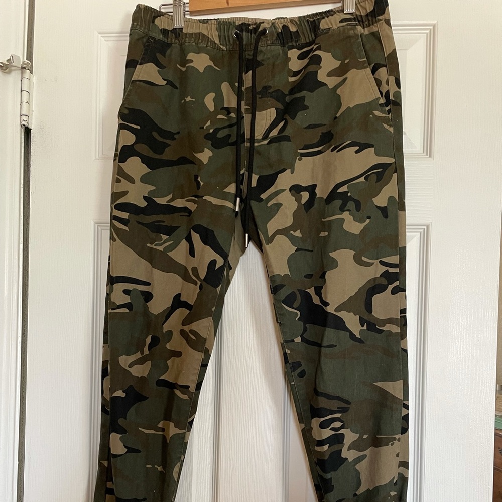 Forever 21 Men’s Camo Jeans. Stretchy at the ankles like around the waist.
